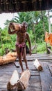 Man Mentawai tribe comes back home from hunting.